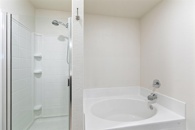 bathroom with separate shower and tub