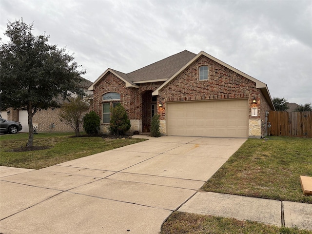 front of property featuring a front yard and a garage