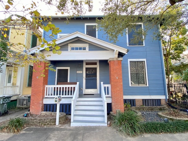 view of front of property featuring covered porch