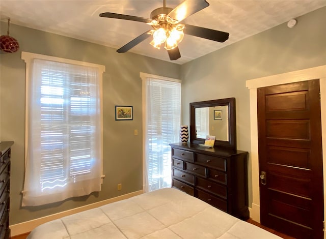 bedroom featuring ceiling fan