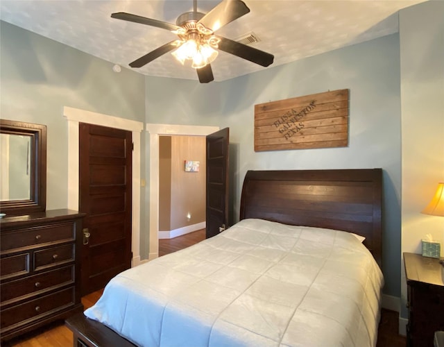 bedroom featuring light wood-type flooring and ceiling fan