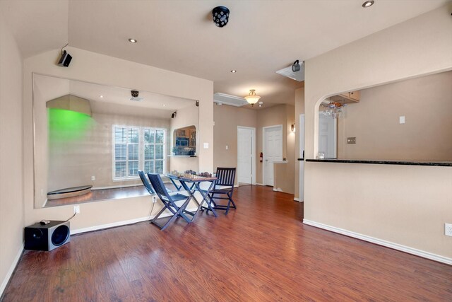 dining space with dark wood-type flooring