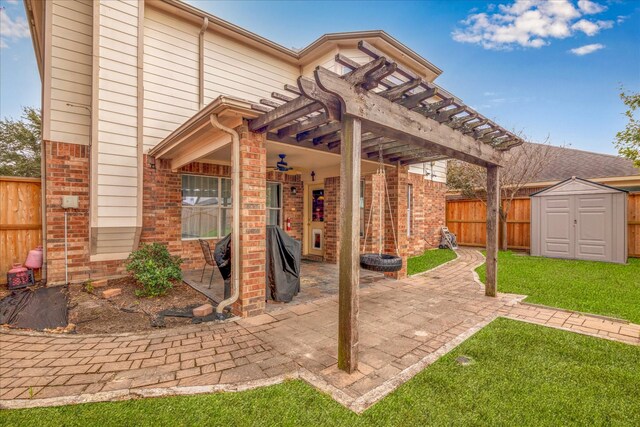 view of patio / terrace with a storage shed and a pergola