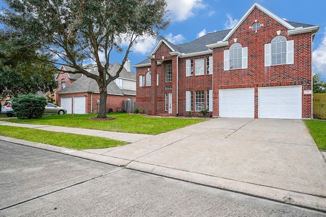 front facade with a front yard and a garage