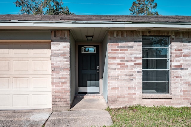 entrance to property with a garage