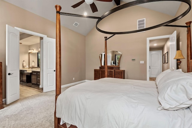 bedroom with vaulted ceiling, baseboards, visible vents, and light carpet