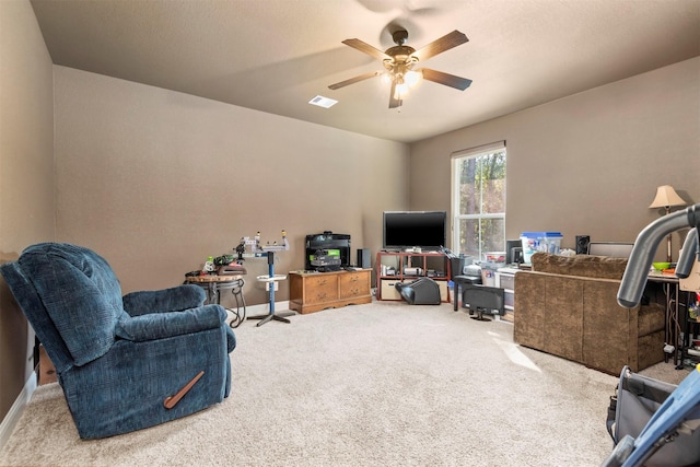 sitting room featuring carpet flooring, a ceiling fan, visible vents, and baseboards