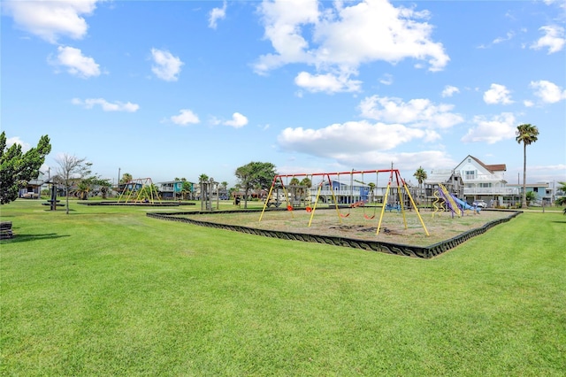 view of playground featuring a lawn