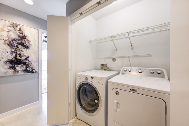 laundry room featuring independent washer and dryer