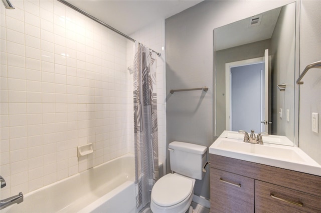 full bathroom with shower / bath combo, toilet, and vanity