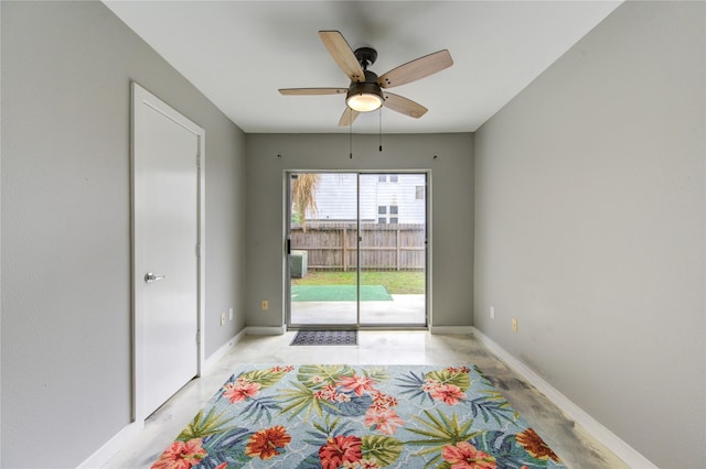 doorway to outside featuring ceiling fan