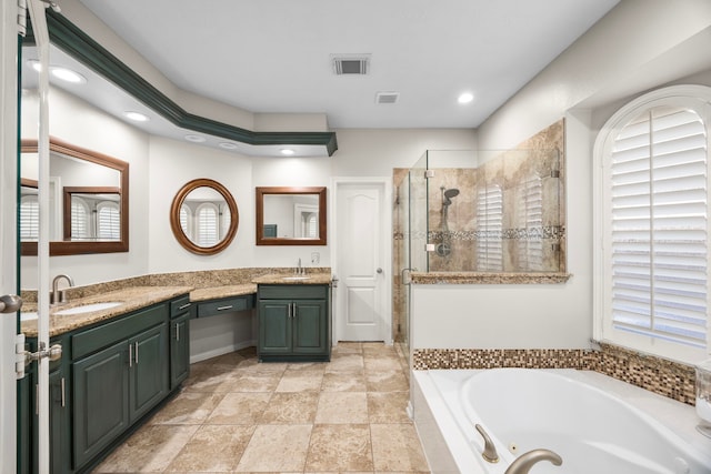 bathroom featuring plus walk in shower and vanity