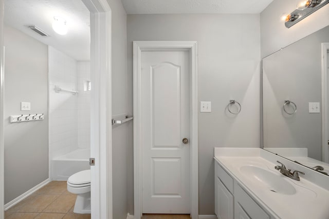 full bathroom featuring vanity, a textured ceiling, shower / tub combination, tile patterned flooring, and toilet