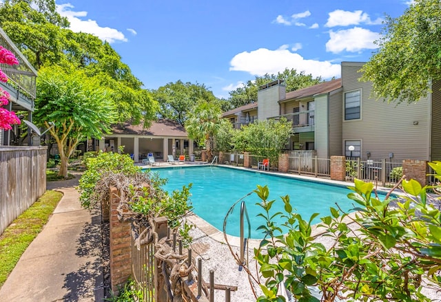 view of swimming pool with a patio area