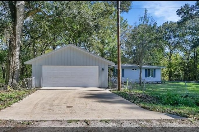 garage with a lawn