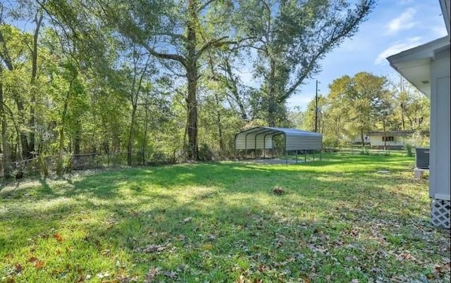 view of yard with a carport