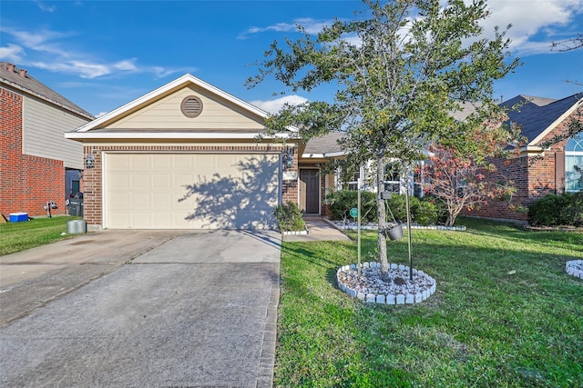 view of front of house featuring a front yard and a garage