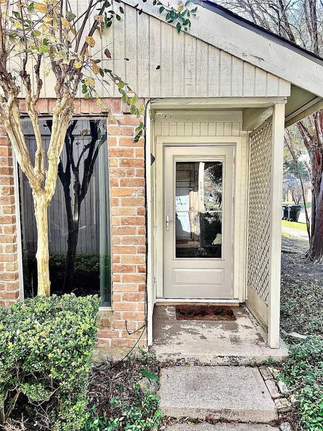 7854 Green Lawn Dr Unit 7854, Houston, TX 77088 - doorway to property featuring brick siding