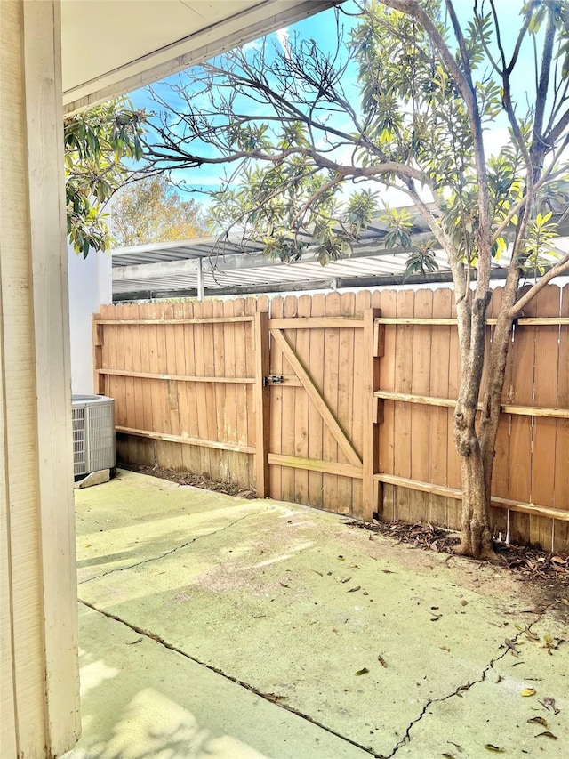 view of yard with central AC unit