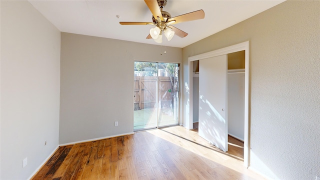 interior space with light wood-type flooring and ceiling fan