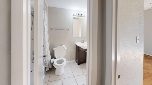 bathroom with vanity, wood-type flooring, and toilet