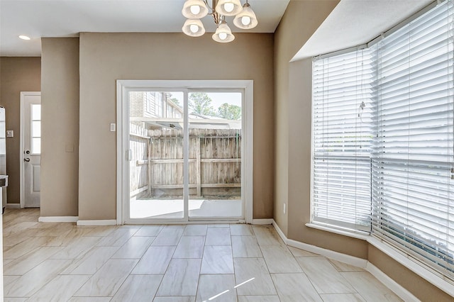 interior space with a chandelier