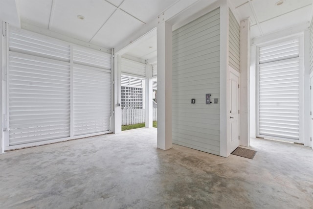 garage with wood walls