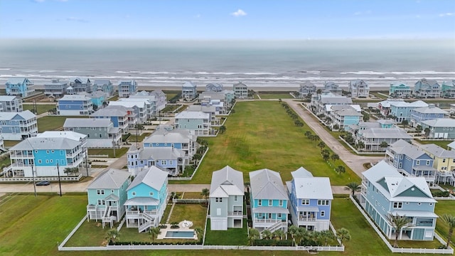 bird's eye view with a water view and a residential view