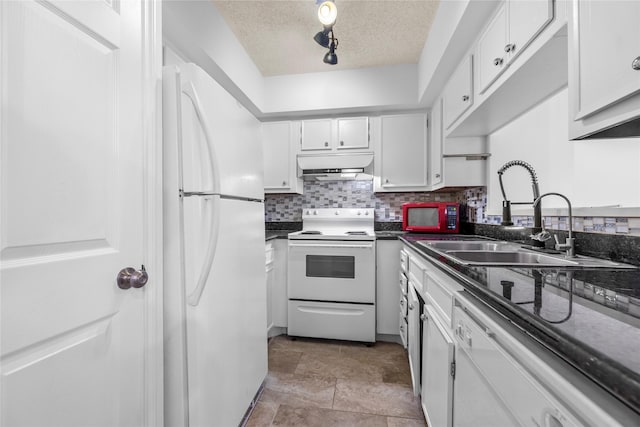 kitchen with white cabinetry, sink, a textured ceiling, track lighting, and white appliances