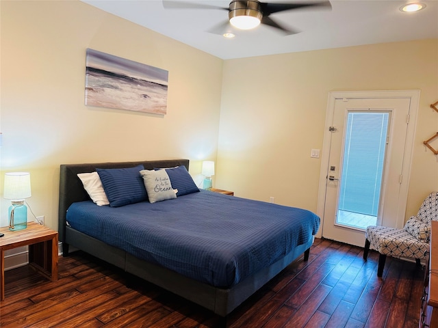 bedroom featuring ceiling fan and dark wood-type flooring