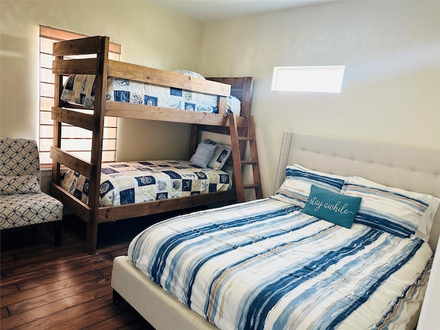 bedroom featuring dark hardwood / wood-style flooring