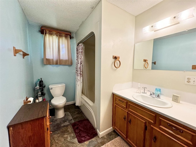 full bathroom featuring vanity, toilet, shower / bath combo with shower curtain, and a textured ceiling