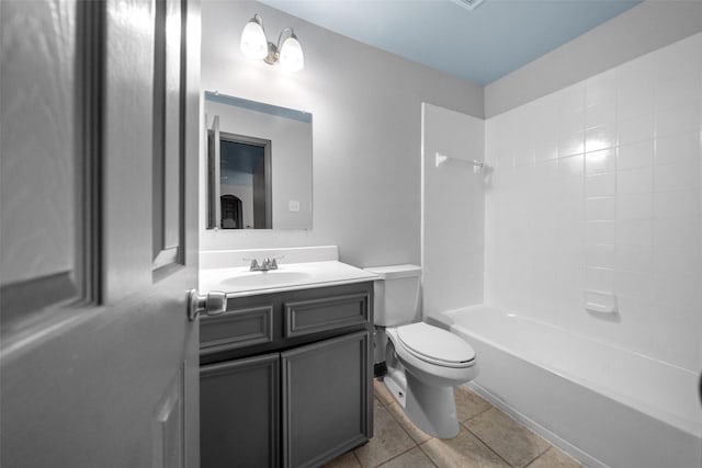 full bathroom featuring tile patterned floors, shower / bathing tub combination, vanity, and toilet