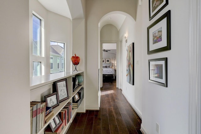 hallway with dark hardwood / wood-style floors