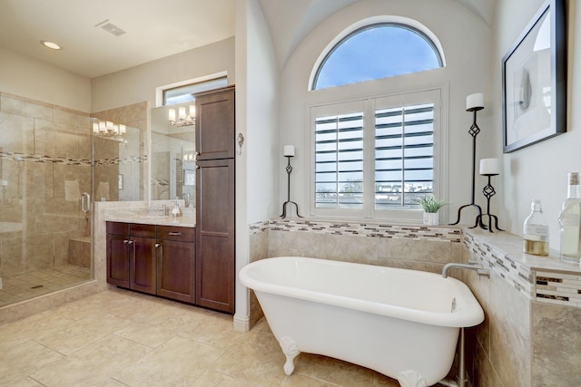 bathroom featuring vanity, tile patterned floors, and independent shower and bath