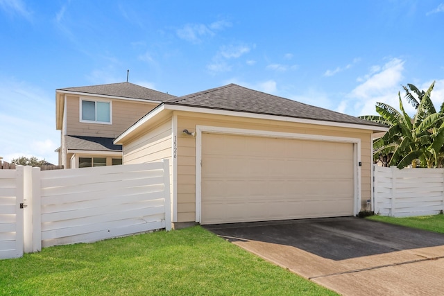 garage with a lawn