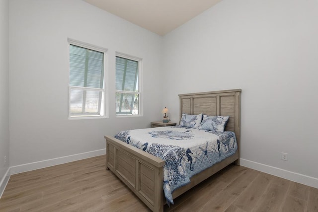 bedroom with light hardwood / wood-style flooring