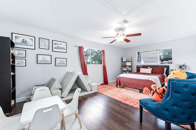 bedroom with hardwood / wood-style flooring and ceiling fan