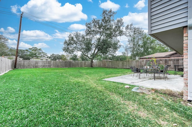 view of yard with a patio area