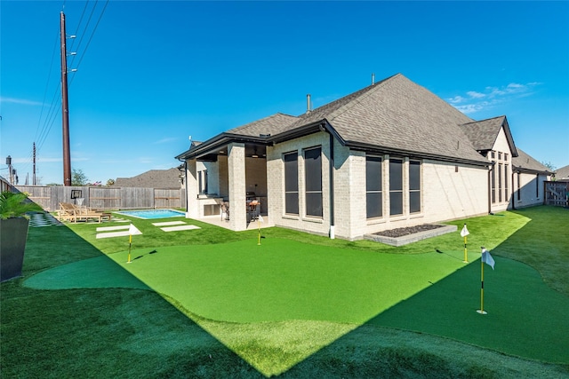 back of house featuring a patio