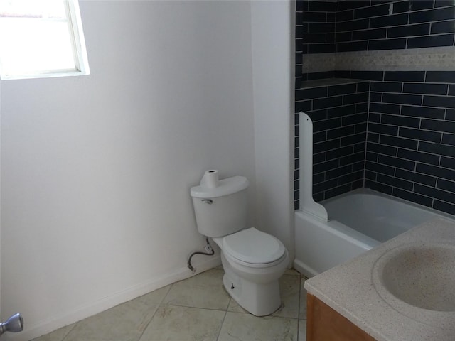 full bathroom with toilet, vanity, and tiled shower / bath