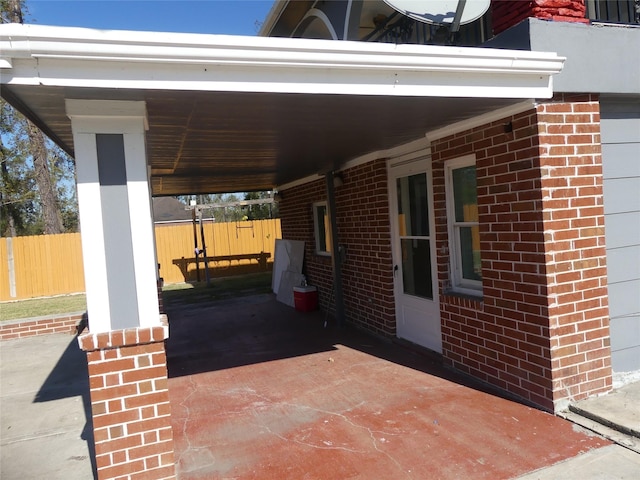 view of patio / terrace with a carport