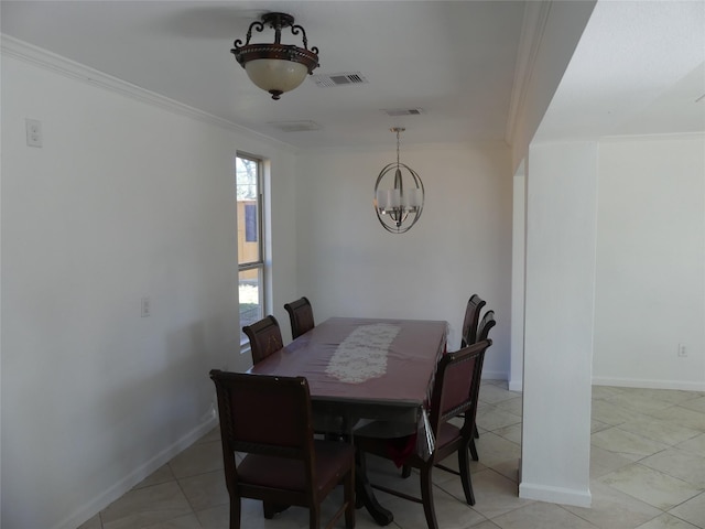 dining space with crown molding, light tile patterned floors, and an inviting chandelier