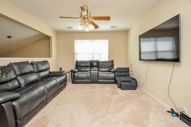 carpeted living room featuring ceiling fan