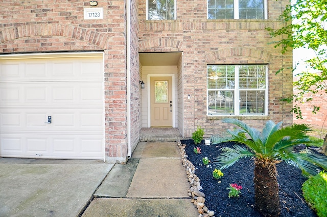 property entrance featuring a garage