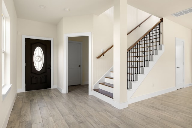 foyer entrance featuring light wood-type flooring