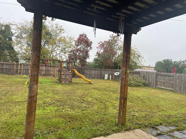 view of yard featuring a playground