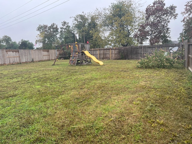 view of yard with a playground