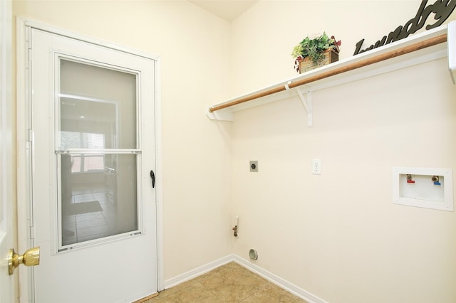 clothes washing area with electric dryer hookup, hookup for a washing machine, and light tile patterned floors