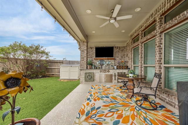 view of patio / terrace featuring ceiling fan